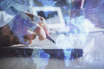 Financial charts displayed on woman's hand taking notes background. Concept of research. Double exposure