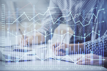 Multi exposure of forex chart with man working on computer on background. Concept of market analysis.
