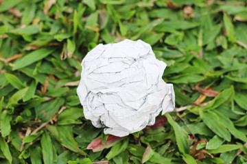 paper ball on green grass