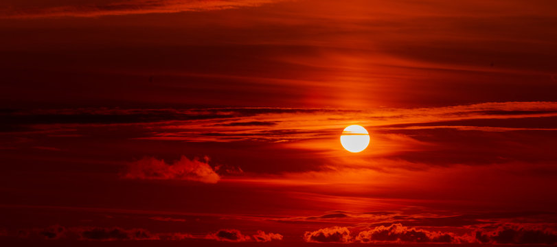 Beautiful sky. red sunlight lighting the clouds softly © EwaStudio