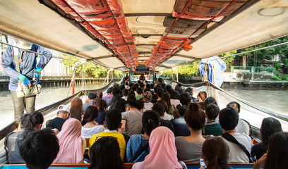 people on river boat of Bangkok, Thailand