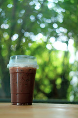 Iced coffee mocha in clear plastic glass