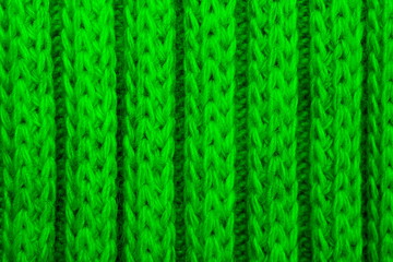 Texture vertical stripe knitting green juicy background, face knitting