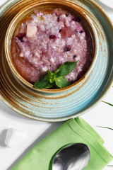 An exquisite culinary dish on a white table. Restaurant serving.