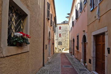 Veroli, Italy, 01/03/2020. A narrow street between the old houses of a medieval village
