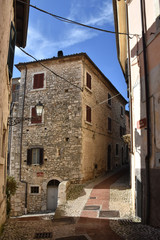 Veroli, Italy, 01/03/2020. A narrow street between the old houses of a medieval village