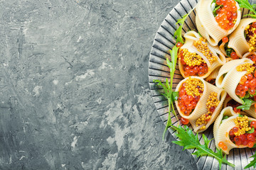 Red caviar stuffed pasta