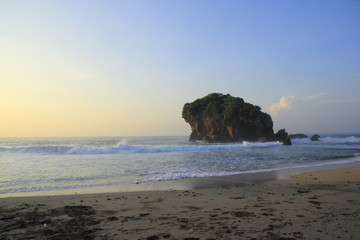 Coral island, waves, which adorn the beauty of the morning atmosphere at Gunungkidul Beach,...