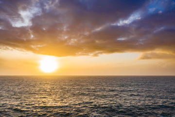 Sunset at Muckross Head while huge waves are coming in - County Donegal, Ireland