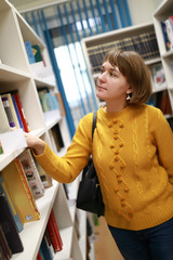 Woman in book library