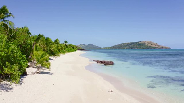 Aerial footage of an idyllic beach in the Yasawa island group in Fiji in the south Pacific ocean