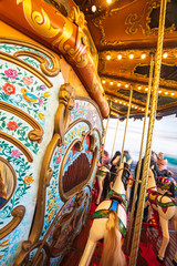 Fototapeta premium Ancient German Horse Carousel built in 1896 in Navona Square, Rome, Italy