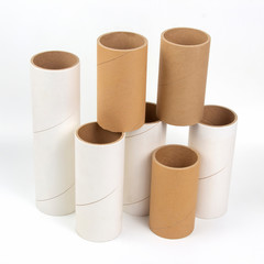 cardboard and paper tubes and pipes on a white background