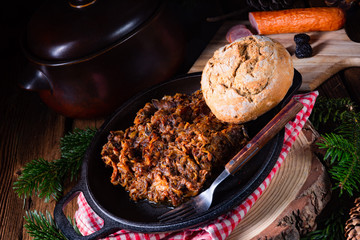 Polish bigos with sausage and dried plum