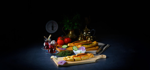 Pide with minced meat, spinach feta and sheep's cheese