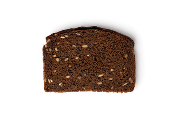 Dark rye bread with sunflower seeds isolated on white background.