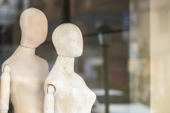 Boutique display window with mannequins