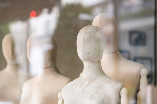 Boutique display window with mannequins - Powered by Adobe
