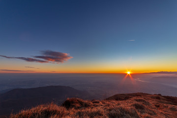 Winter sunset from an alpine peak of Friuli-Venezia Giulia