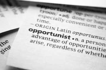Fototapeta premium Word or phrase Opportunist in a dictionary.