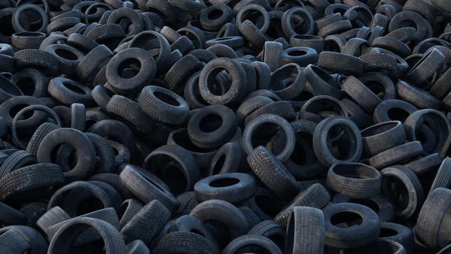 Pile of old car tyres storage. Stack of used tires junkyard. Heap black wheels ecology hazard. Environment disaster concept.   