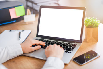 Woman working on laptop in office. Mockup Copyspace Computer or Notebook Concept