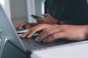 Working on laptop computer
