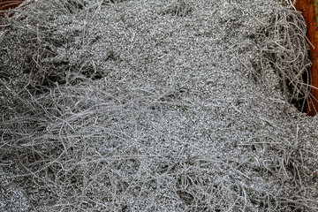 Aluminum shavings. Aluminum processing on CNC machines in production.