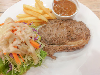 Steak and vegetable salad on the plate
