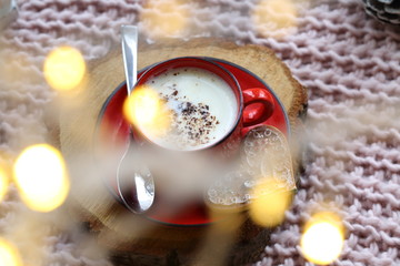 christmas balls and candles on black background