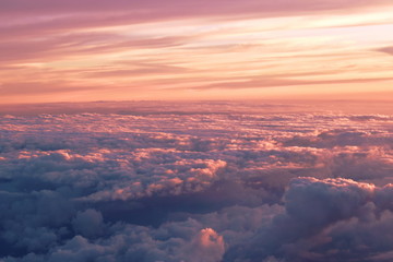 landscape of cloud floating on sky through window plane in sunset