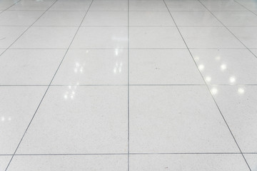 The glossy tile floor