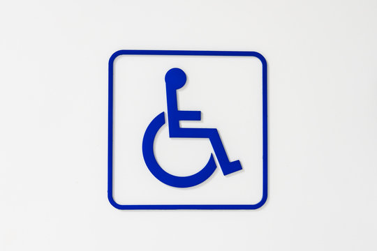 The blue disability sign on white background