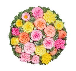 Top view of colorful and beautiful cake topping decoration in roses pattern on white background with clipping path