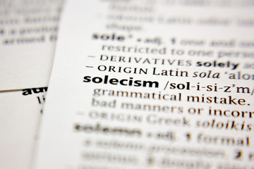 Fototapeta premium Word or phrase solecism in a dictionary.