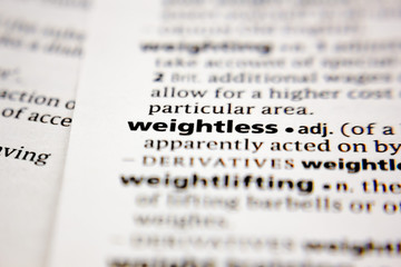 Word or phrase weightless in a dictionary.