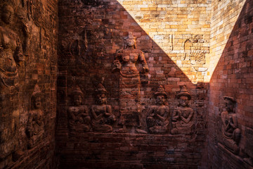Sculpture of Hindu gods on the wall of Angkor Wat, Cambodia