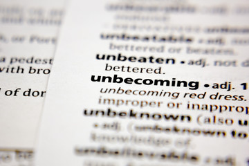 Word or phrase unbecoming in a dictionary.