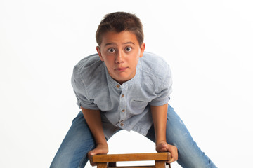 Obraz premium Young boy doing crazy photo session 