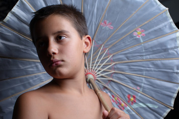 Young boy doing crazy photo session 