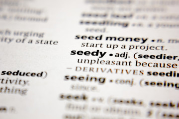 Word or phrase seedy in a dictionary.