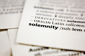Fototapeta premium Word or phrase solemnity in a dictionary.