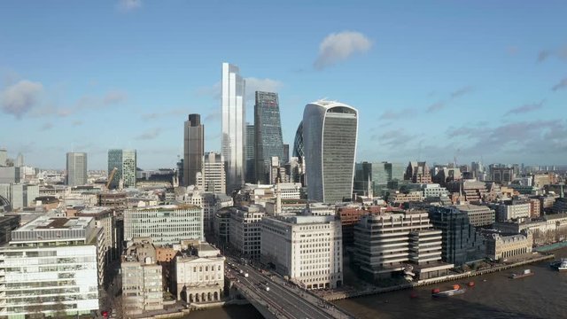 London city centre aerial panorama view: financial district, Thames river, Belfast, skyscrappers, warf and buildings and St. Pauls Cathedral, Tower Bridge and The Tower