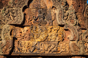 Sculpture of Hindu gods on the wall of Banteay Srei, Angkor Wat, Cambodia