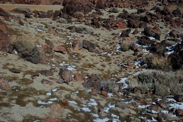 Teide volcano with some snow and rocks located at Teide National Park, Tenerife, Canary Islands