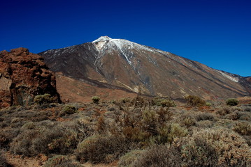 Teide volcano with some snow and rocks located at Teide National Park, Tenerife, Canary Islands