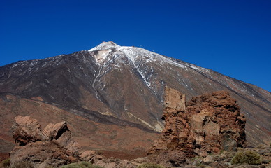 Teide volcano with some snow and rocks located at Teide National Park, Tenerife, Canary Islands