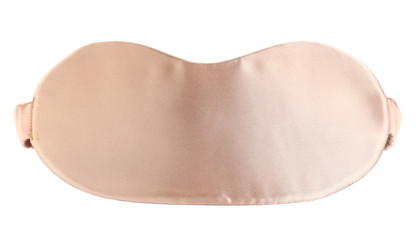 Beige sleeping mask isolated on white. Bedtime accessory