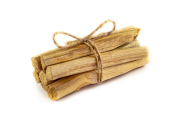 Palo Santo incense woods close-up, isolated on white background. Natural smudge sticks.