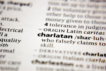 Word or phrase charlatan in a dictionary. - obrazy, fototapety, plakaty